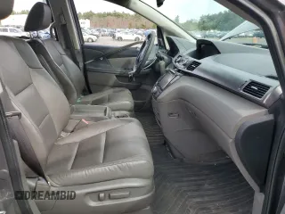 2015 Honda Odyssey Touring Elite with VIN 5FNRL5H95FB117971, listed as a Copart auction lot 52083475 with 82,626 mi miles and Salvage Title. Bid and sale history available at DreamBid. Image 7.