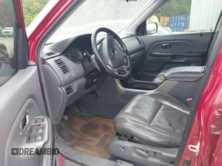 2003 Honda Pilot EX with VIN 2HKYF18513H608933, listed as a IAAI auction lot 42123663 with 309,649 mi miles and . Bid and sale history available at DreamBid. Image 5.