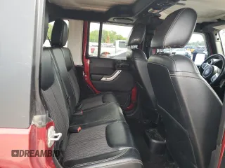 2013 Jeep Wrangler Unlimited Freedom z VIN 1C4BJWDG7DL582764, wystawiony jako Copart lot #54133275 z przebiegiem 183 507 mil mil oraz Szkoda całkowita • Salvage title. Historia ofert i sprzedaży dostępna na DreamBid. Obrazek 11.