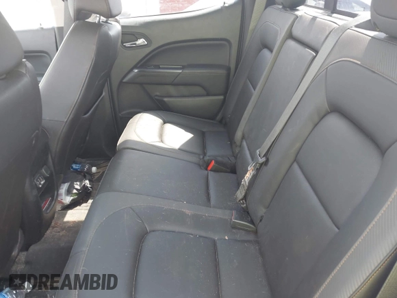 2021 GMC Canyon 4WD AT4 z VIN 1GTG6FENXM1291689, wystawiony jako IAAI lot #42038884 z przebiegiem 54 884 mil mil oraz . Historia ofert i sprzedaży dostępna na DreamBid. Obrazek 8.