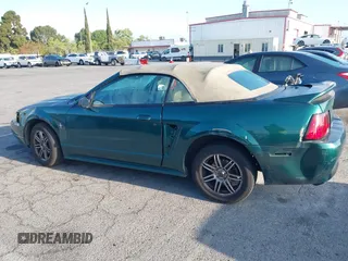 2000 Ford Mustang with VIN 1FAFP444XYF207441, listed as a IAAI auction lot 42120700 with 119,335 mi miles. Bid and sale history available at carsss.com. Image 14.