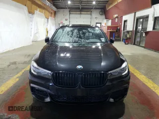 2019 BMW 7 Series 740i xDrive with VIN WBA7E4C50KGV28708, listed as a Copart auction lot 55141895 with 130,925 mi miles and Clean title. Bid and sale history available at DreamBid. Image 5.