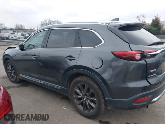 2016 Mazda CX-9 Grand Touring with VIN JM3TCADY4G0111310, listed as a IAAI auction lot 41532851 with 178,907 mi miles and . Bid and sale history available at DreamBid. Image 14.