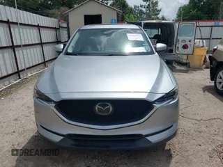 2018 Mazda CX-5 Grand Touring with VIN JM3KFADM6J0339185, listed as a IAAI auction lot 42160763 with 86,312 mi miles and . Bid and sale history available at DreamBid. Image 12.