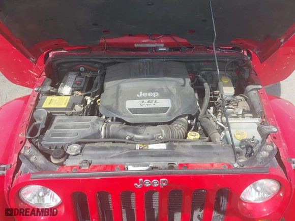 2012 Jeep Wrangler Unlimited Sahara with VIN 1C4HJWEGXCL209449, listed as a IAAI auction lot 41864432 with 100,917 mi miles. Bid and sale history available at carsss.com. Image 10.