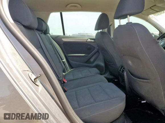 2012 Volkswagen Golf TDI z VIN WVWDM7AJXCW009568, wystawiony jako Copart lot #57956365 z przebiegiem 168 640 mil mil oraz Czysty tytuł • Clean title. Historia ofert i sprzedaży dostępna na DreamBid. Obrazek 11.