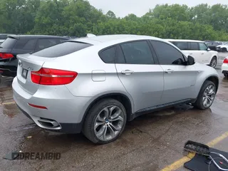 2012 BMW X6 50i z VIN 5UXFG8C58CL590171, wystawiony jako IAAI lot #42357805 z przebiegiem 83 144 mil mil oraz . Historia ofert i sprzedaży dostępna na DreamBid. Obrazek 4.