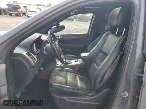 2020 Jeep Grand Cherokee Altitude z VIN 1C4RJFAG2LC257778, wystawiony jako Copart lot #53754825 z przebiegiem 97 595 mil mil oraz Szkoda całkowita • Salvage title. Historia ofert i sprzedaży dostępna na DreamBid. Obrazek 7.