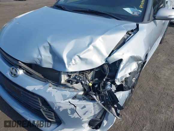 2014 Scion tC with VIN JTKJF5C78E3072572, listed as a IAAI auction lot 39680670 with 112,584 mi miles. Bid and sale history available at carsss.com. Image 6.