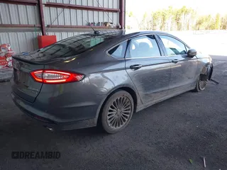 2013 Ford Fusion Titanium Hybrid with VIN 3FA6P0RU0DR277092, listed as a IAAI auction lot 41811079 with 123,071 mi miles. Bid and sale history available at carsss.com. Image 4.