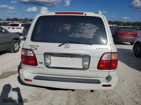 2003 Lexus LX 470 with VIN JTJHT00W833533180, listed as a Copart auction lot 75102374 with 0 mi miles and Non Repairable. Bid and sale history available at carsss.com. Image 6.
