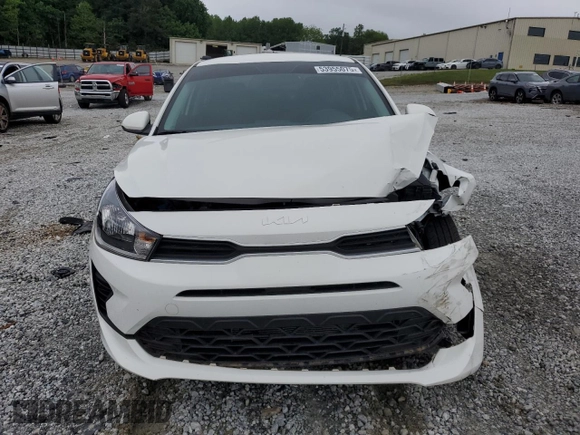 2023 Kia Rio LX z VIN 3KPA24AD6PE604127, wystawiony jako Copart lot #53955075 z przebiegiem 12 319 mil mil oraz Szkoda całkowita • Salvage title. Historia ofert i sprzedaży dostępna na DreamBid. Obrazek 5.