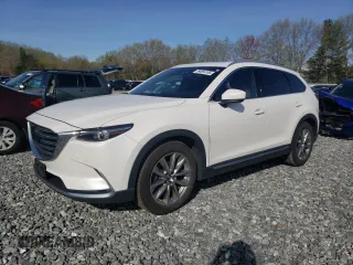2018 Mazda CX-9 Signature with VIN JM3TCBEY1J0214583, listed as a Copart auction lot 54864165 with 118,572 mi miles and Salvage title. Bid and sale history available at DreamBid. Image 1.
