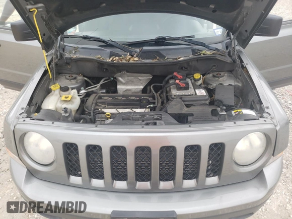 2014 Jeep Patriot Sport with VIN 1C4NJPBA4ED595288, listed as a Copart auction lot 70340814 with 154,585 mi miles and Salvage title. Bid and sale history available at DreamBid. Image 13.