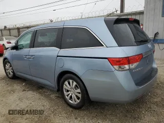 2014 Honda Odyssey EX-L with VIN 5FNRL5H68EB103941, listed as a Copart auction lot 60715095 with 109,013 mi miles and Salvage title. Bid and sale history available at DreamBid. Image 2.