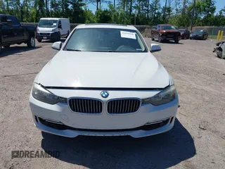 2013 BMW 3 Series 328i xDrive with VIN WBA3B5C51DJ599144, listed as a IAAI auction lot 42059260 with 84,153 mi miles. Bid and sale history available at carsss.com. Image 6.