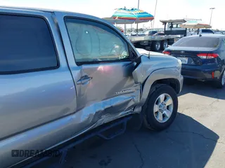 2014 Toyota Tacoma PreRunner with VIN 5TFJU4GN3EX051198, listed as a IAAI auction lot 41764088 with 126,259 mi miles. Bid and sale history available at carsss.com. Image 6.