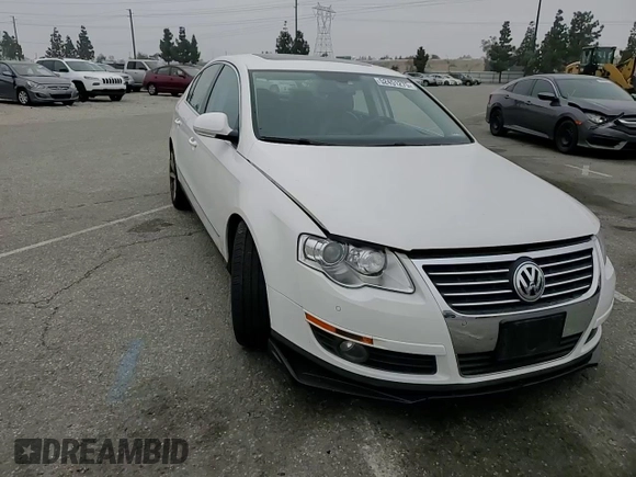 2008 Volkswagen Passat z VIN WVWCU73C58P028217, wystawiony jako Copart lot #52451275 z przebiegiem 70 829 mil mil oraz Szkoda całkowita • Salvage title. Historia ofert i sprzedaży dostępna na DreamBid. Obrazek 11.