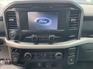 2022 Ford F-150 XL with VIN 1FTFW1E58NKD69493, listed as a IAAI auction lot 42082668 with 49,525 mi miles. Bid and sale history available at carsss.com. Image 1.
