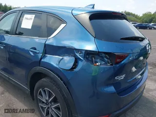 2018 Mazda CX-5 Touring with VIN JM3KFBCM3J0424797, listed as a IAAI auction lot 39864455 with 67,720 mi miles. Bid and sale history available at carsss.com. Image 6.