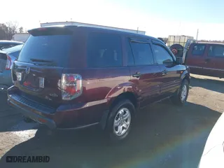 2007 Honda Pilot LX with VIN 2HKYF18167H510970, listed as a IAAI auction lot 40827681 with 119,011 mi miles. Bid and sale history available at carsss.com. Image 4.