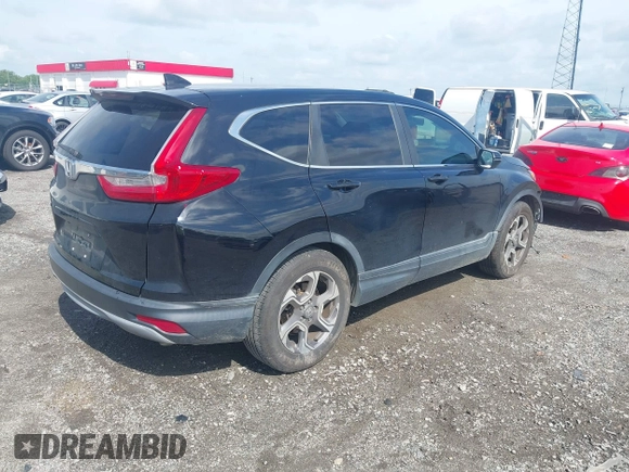 2018 Honda CR-V EX with VIN 7FARW1H59JE001943, listed as a IAAI auction lot 42123180 with 72,451 mi miles and . Bid and sale history available at carsss.com. Image 4.