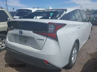 2022 Toyota Prius L Eco with VIN JTDKAMFUXN3181752, listed as a IAAI auction lot 42015717 with 129,637 mi miles and . Bid and sale history available at DreamBid. Image 4.