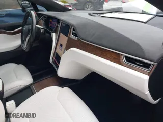 2016 Tesla Model X 70D with VIN 5YJXCAE2XGF014165, listed as a IAAI auction lot 41474490 with 112,967 mi miles. Bid and sale history available at carsss.com. Image 5.