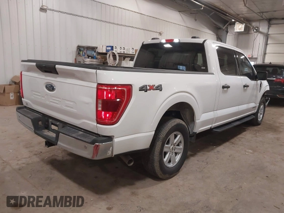 2023 Ford F-150 XL with VIN 1FTFW1ED6PFC14587, listed as a IAAI auction lot 41827273 with 87,267 mi miles. Bid and sale history available at carsss.com. Image 4.