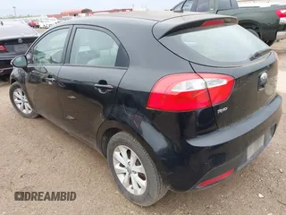 2013 Kia Rio SX with VIN KNADN5A36D6245572, listed as a IAAI auction lot 42182188 with 205,142 mi miles and . Bid and sale history available at DreamBid. Image 3.