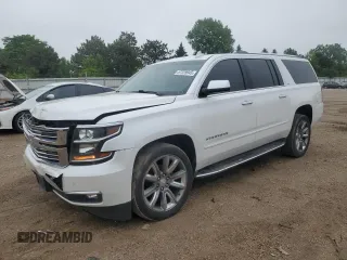 2016 Chevrolet Suburban LTZ with VIN 1GNSKJKC8GR160205, listed as a Copart auction lot 57229945 with 102,809 mi miles and Salvage title. Bid and sale history available at DreamBid. Image 1.
