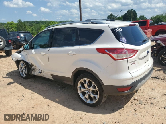 2013 Ford Escape Titanium with VIN 1FMCU0J98DUC67136, listed as a Copart auction lot 57967495 with 72,258 mi miles and Salvage title. Bid and sale history available at DreamBid. Image 2.