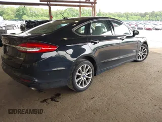 2017 Ford Fusion Titanium with VIN 3FA6P0SU3HR268788, listed as a IAAI auction lot 42413877 with 193,561 mi miles and . Bid and sale history available at DreamBid. Image 4.
