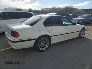 2000 BMW 7 Series 740iA with VIN WBAGG8341YDN78262, listed as a Copart auction lot 77690714 with 217,607 mi miles and Salvage Title. Bid and sale history available at carsss.com. Image 3.