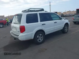 2005 Honda Pilot EX-L with RES with VIN 2HKYF186X5H530910, listed as a IAAI auction lot 41167862 with 199,775 mi miles. Bid and sale history available at carsss.com. Image 4.
