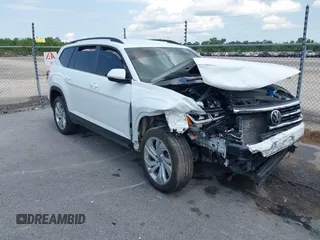 2021 Volkswagen Atlas SE z VIN 1V2WR2CA5MC569901, wystawiony jako IAAI lot #42397774 z przebiegiem 75 802 mil mil oraz . Historia ofert i sprzedaży dostępna na DreamBid. Obrazek 1.