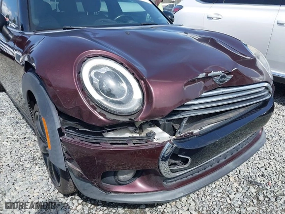 2016 MINI Cooper Clubman with VIN WMWLN5C57G2E30917, listed as a IAAI auction lot 41992494 with 38,567 mi miles. Bid and sale history available at carsss.com. Image 6.