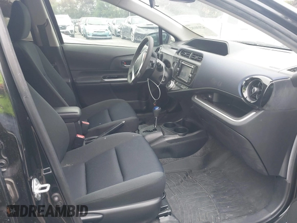 2017 Toyota Prius One with VIN JTDKDTB32H1597017, listed as a IAAI auction lot 42030182 with 56,461 mi miles and . Bid and sale history available at carsss.com. Image 5.