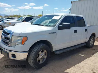 2014 Ford F-150 XL with VIN 1FTEW1CM7EKG57737, listed as a IAAI auction lot 42046953 with 145,796 mi miles. Bid and sale history available at carsss.com. Image 2.