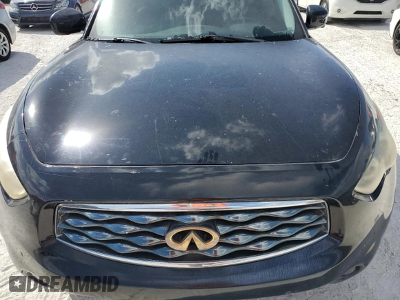 2009 Infiniti FX35 with VIN JNRAS18U29M104295, listed as a Copart auction lot 77149894 with 0 mi miles and Non Repairable. Bid and sale history available at carsss.com. Image 12.