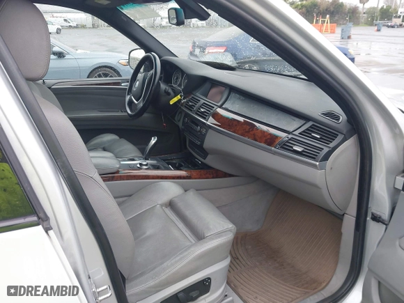 2007 BMW X5 3.0si with VIN 5UXFE43597L017476, listed as a IAAI auction lot 41459147 with 184,494 mi miles. Bid and sale history available at carsss.com. Image 5.