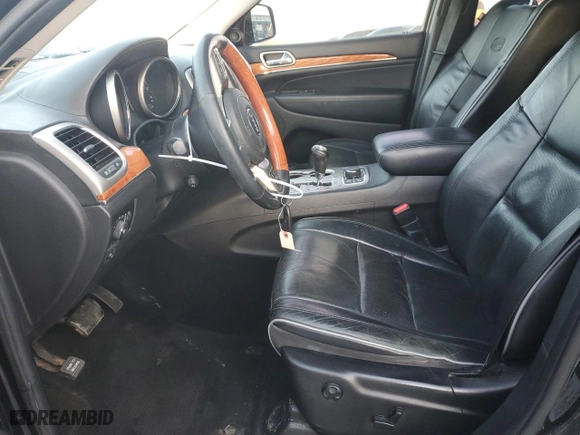 2012 Jeep Grand Cherokee Overland with VIN 1C4RJFCG0CC342518, listed as a Copart auction lot 41521325 with 174,896 mi miles and Clean Title. Bid and sale history available at carsss.com. Image 7.