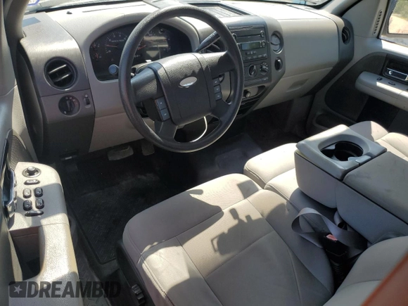 2007 Ford F-150 STX with VIN 1FTRX12W07FB12170, listed as a Copart auction lot 50452015 with 169,814 mi miles and Salvage title. Bid and sale history available at DreamBid. Image 8.