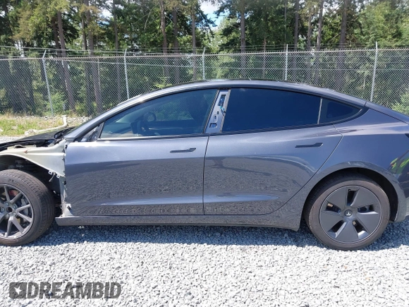 2023 Tesla Model 3 z VIN 5YJ3E1EA6PF650212, wystawiony jako IAAI lot #42554747 z przebiegiem 49 838 mil mil oraz . Historia ofert i sprzedaży dostępna na DreamBid. Obrazek 15.