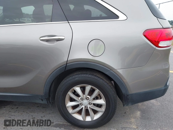 2016 Kia Sorento LX with VIN 5XYPGDA51GG012335, listed as a IAAI auction lot 42224249 with 166,752 mi miles and . Bid and sale history available at DreamBid. Image 20.