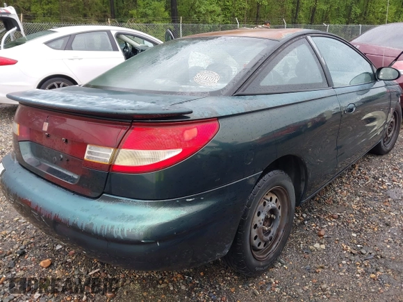 1997 Saturn SC z VIN 1G8ZG1277VZ342397, wystawiony jako IAAI lot #41966570 z przebiegiem 184 054 mil mil oraz . Historia ofert i sprzedaży dostępna na DreamBid. Obrazek 4.