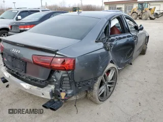 2018 Audi S6 Prestige z VIN WAUHFAFC0JN104241, wystawiony jako Copart lot #70887562 z przebiegiem 89 551 mil mil oraz . Historia ofert i sprzedaży dostępna na DreamBid. Obrazek 3.