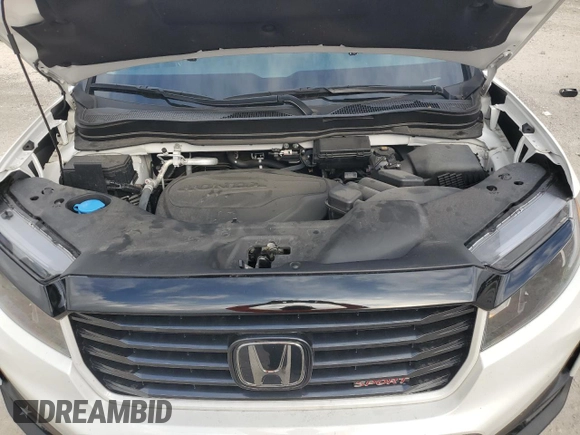 2023 Honda Ridgeline Sport z VIN 5FPYK3F17PB059645, wystawiony jako Copart lot #46273965 z przebiegiem 24 861 mil mil oraz Szkoda całkowita • Salvage title. Historia ofert i sprzedaży dostępna na DreamBid. Obrazek 11.