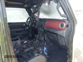 2022 Jeep Gladiator Rubicon z VIN 1C6JJTBG1NL163699, wystawiony jako IAAI lot #41014300 z przebiegiem Nie podano mil oraz . Historia ofert i sprzedaży dostępna na DreamBid. Obrazek 6.