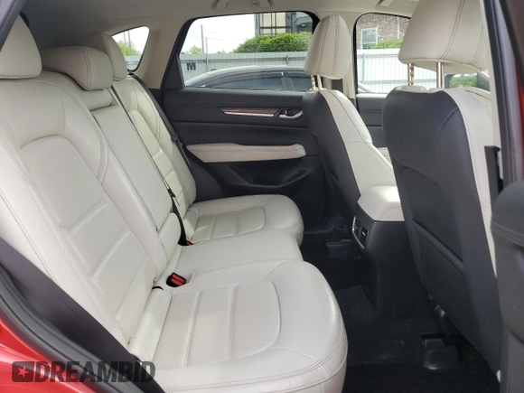 2019 Mazda CX-5 Grand Touring with VIN JM3KFBDM1K0559891, listed as a Copart auction lot 58775275 with 45,126 mi miles and Salvage title. Bid and sale history available at DreamBid. Image 11.